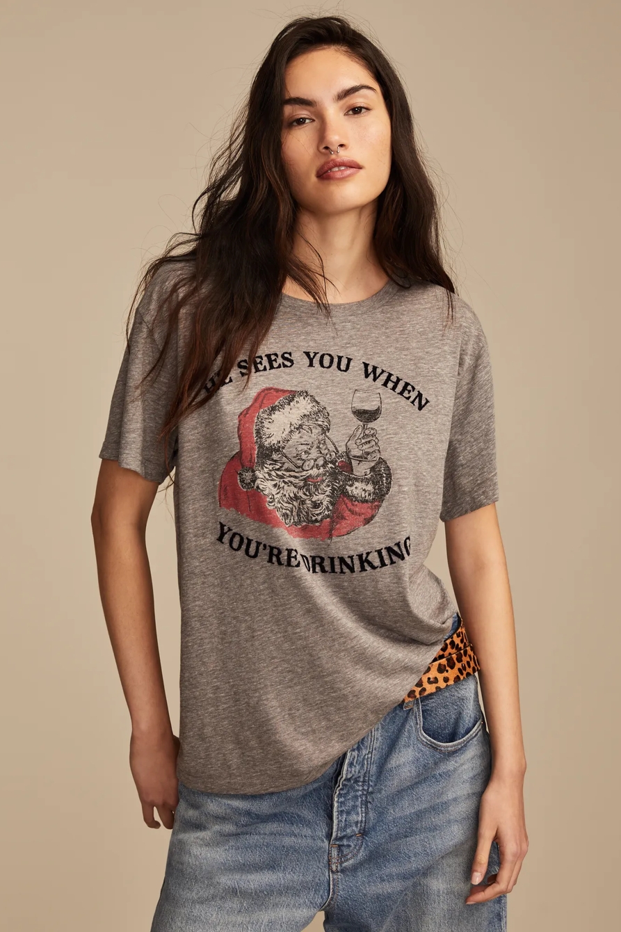 HE SEES YOU WHEN YOURE DRINKING BOYFRIEND TEE, image 1